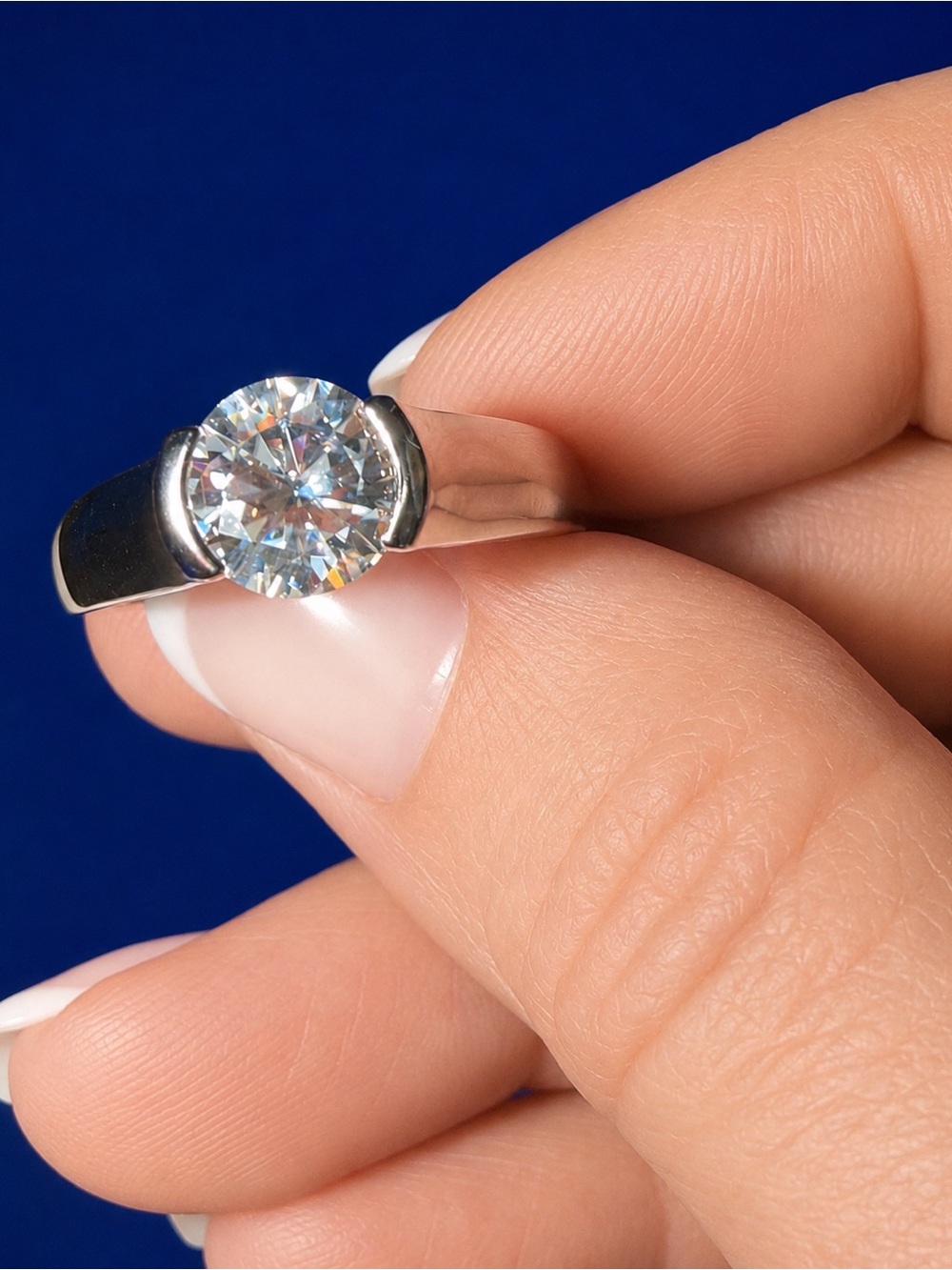 2 Carat Round Solitaire Moissanite, Set in Sterling Silver. Size 8.